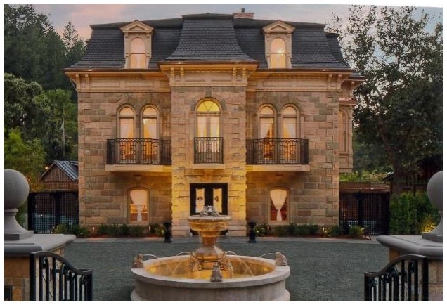 Street view of the front and yard of the restored French Empire style Francis House bed and breakfast.